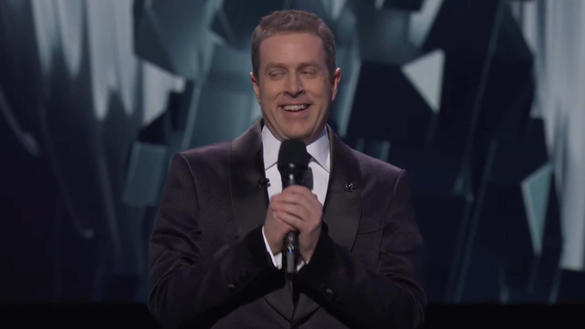 A picture shows presenter Geoff Keighley smiling sheepishly. 